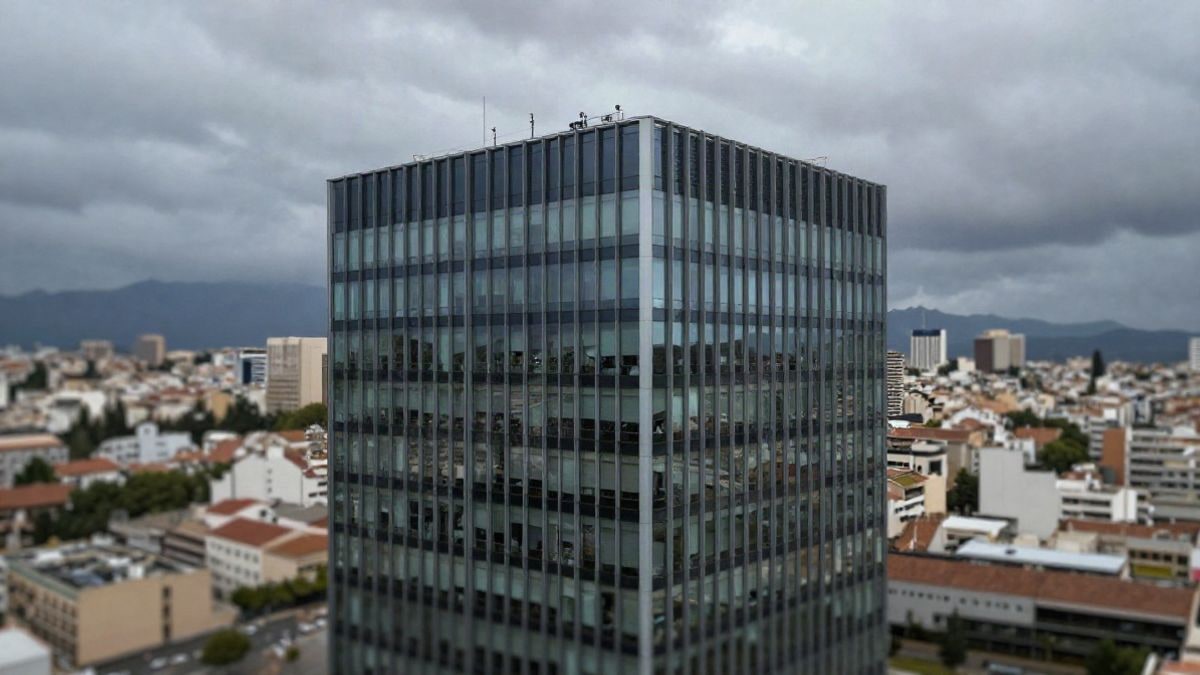 Illustrative image: aerial view of a modern building representing technology and innovation in a business context.