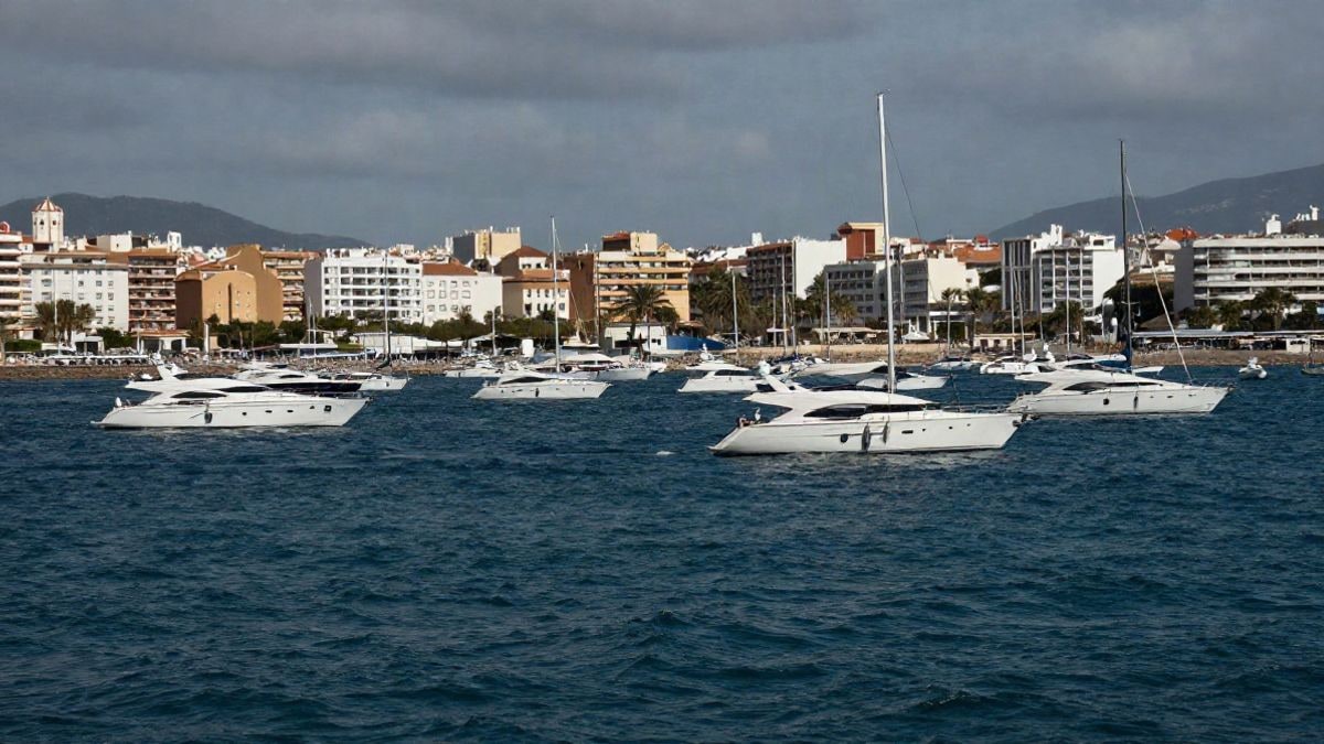 Illustrative image: scenic view of a luxurious coastline with yachts and clear water, symbolising wealth and financial reform.