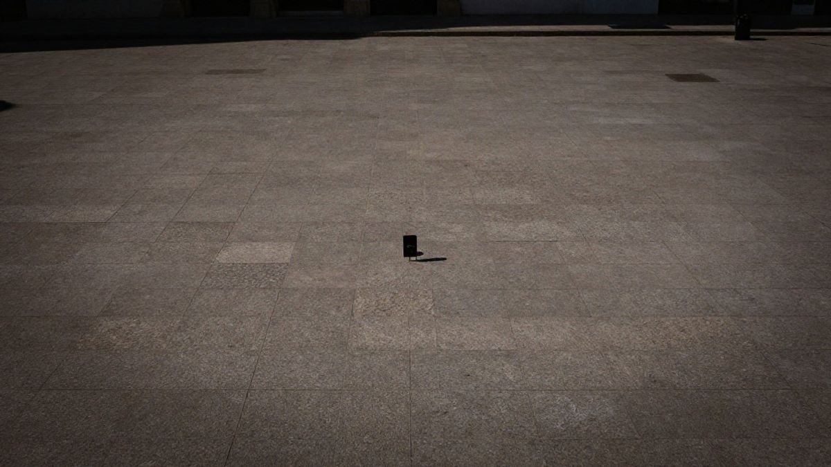 Illustrative image: an empty Treasury office with documents on the table, symbols of tax collection in an administrative setting.